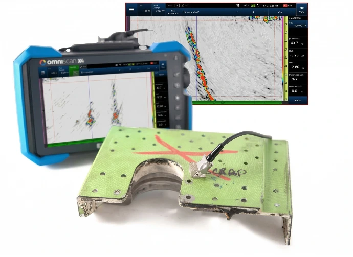 Equipo OmniScan X4 evaluando una pieza aeroespacial y mostrando indicaciones precisas de defectos mediante tecnología Phase Coherence Imaging (PCI).